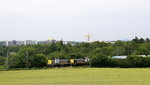 Der Kalkleerzug von Oberhausen-West(D) nach Hermalle-Huy(B) wird von zwei Belgischen Rangierloks die Gemmenicher-Rampe hochgezogen.
Aufgenommen vom Friedrichweg an der Montzenroute. 
Am Nachmittag vom 7.7.2016.