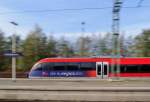Mitzieher (1/20 , ISO-100,F/18, Freihand), Talent der Euregiobahn fahrt in Herzogenrath auf Bahnsteig 3 ein.