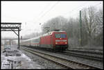 101041-2 fährt hier am 4.3.2006 um 9.14 Uhr mit einem Intercity Richtung Osnabrück durch den Bahnhof Natrup Hagen.