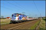 110 321-7 mit IC 2576 Stralsund-Wilmersdorf (Angermnde) am 22.04.2008 in Hhe der Ortschaft Teschenhagen. Am Zugschluss hngt 110 243-3, die fr den Pendelbetrieb kalt mitluft.