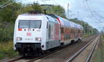 DB Fernverkehr AG [D] mit  101 063-6/100 Jahre Bauhaus  [NVR-Nummer: 91 80 6101 063-6 D-DB] und PbZ bestehend aus einer DB Regio Doppelstockgarnitur Richtung Berlin-Lichtenberg am 02.10.19 Bahnhof