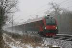 RJ 63, aufgenommen bei heftigem Schneefall am 01.01.2009 in Haar.