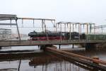 01 150 vor einem Sonderzug auf der Klappbrücke in Emden am 05.03.2016.