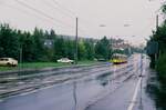 Historischer Straßenbahnzug aus TW 851 (MF Esslingen Serie T2) und zwei Beiwagen der Serie B2 ( Schiffchen ) ziemlich allein im Regen zwischen Weilimdorf und Feuerbach (1988 ?)