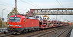 DB Cargo AG [D] mit  193 384  [NVR-Nummer: 91 80 6193 384-5 D-DB] Und PKW-Transportzug am 22.10.19 Durchfahrt Bf.