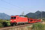 185 363 mit leerem Autotransportwagen in Richtung Sonnenuntergang unterwegs auf der KBS 951 am 12.07.2021