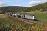 185 578 von  AKIEM  mit einem Autozug am 1. Oktober 2022 bei Harrbach im Maintal.