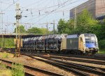 1216 953-0 von der Wiener-Lokalbahnen kommt aus Richtung Kln mit einem Dacia-Autozug und fhrt in Aachen-West ein bei Sommerwetter am 24.5.2012.
