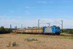 Am 1.August 2013 war TXL 185 512 mit einem Altmann-Zug bei Elze(Han) auf dem Weg Richtung Sden.