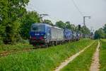 193 495 HUPAC Vectron mit Container in Dülken, am 19.05.2019.