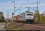 Containerzug mit 386 026-9 unterwegs in Magdeburg Herrenkrug Richtung Biederitz.