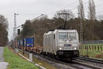 Metrans 386 032-7 auf der Hamm-Osterfelder Strecke am BÜ km 66,7 Kerstheiderstr. 23.3.2023