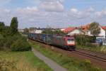 Crossrail 185 600-4 mit einem LKW-Walter Zug in Nauheim bei Gro Gerau am 10.08.2011 