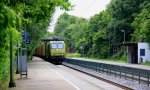 145 CL-031 von Alpha Trains kommt durch Aachen-Eilendorf mit einem Containerzug aus Aachen-West und fhrt in Richtung Kln bei Sommerwetter mit Wolken am 21.6.2012.