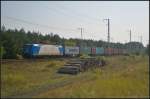 ITL 185 522-9 mit einem Container-Zug am 16.09.2014 durch die Berliner Wuhlheide