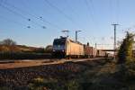 Ausfahrt am 09.11.2013 von CBRail/Crossrail 185 581-6  Ewals Cargo  mit einem Containerzug in Müllheim (Baden).