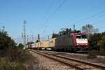 Mit einem Containerzug (Antwerpen - Italien) fuhr am 27.09.2014 die 185 594-9 zwischen den Überholgleisen in Orschweier gen Schweiz.