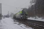 CAT 1116 142 mit gemischten Gterzug am 15.02.2013 in Aling.