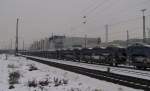 Mosolf Laaers Autozugtransportwagen mit Buick Regals nach Zeebruegge, in Rsselsheim Opelwerke; 22.12.2010