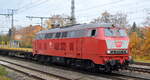 Railsystems RP GmbH, Gotha mit  218 319-2  (NVR:   92 80 1218 319-2 D-RPRS ) und einem Ganzzug Oberbaustoffwagen von Eiffage Rail (leer) am 03.11.21 in Golm (Potsdam).