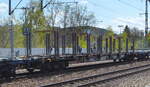 Drehgestell-Flachwagen mit Niederbindeeinrichtungen vom Einsteller SBB Cargo mit der Nr.