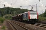 186 182-2 mit einem Schotterzug in Kln West am 27.07.2010