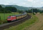 185 404-1 der TXL ist mit einem ARS Altmann Autozug am 06.07.2012 bei Wernfeld