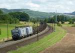 143 630-5 und 142 048-7 sind mit einem Gterzug am 31.07.2012 bei Wernfeld