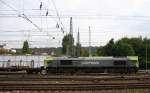 Die Class 66 6603 von Captrain fährt mit einem Aluminiumleerzug aus Nievenheim bei Dormagen nach Kinkempois(B)Dunkerque(F) bei Ausfahrt aus Aachen-West und fährt in Richtung Montzen/Belgien.