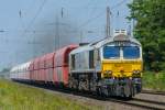 ECR 247 016-9 durchquert in der Mittagshitze des 04.07.2015 Ratingen-Lintorf.