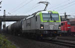 Vectron 193 782-0 von Captrain kommend aus Lüneburg. Im Hintergrund eine der zwei BR 151 (151 112-0, 151 110-4) in Doppeltraktion mit dem täglichen Erzverkehr. Höhe Bardowick 27.09.2017