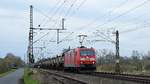 DB Cargo 185 195 mit Schwefelzug GG 60172 Groenkneten - Frankfurt (M.)-Hchst Gbf (Diepholz, 18.03.2020).