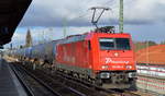 RheinCargo GmbH & Co. KG, Neuss [D] mit  185 584-0/2052  [NVR-Nummer: 91 80 6185 584-0 D-RHC] und Kesselwagenzug (Benzin) am 17.03.21 Berlin-Karow.