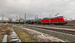 Kesselzug mit 185 143-5 unterwegs in Halle (Saale), Karl-von-Thielen-Straße, auf der Ostumfahrung für den Güterverkehr in südlicher Richtung.