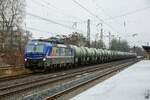 193 565 RTB Cargo mit Kesselzug in Hilden, Januar 2023.