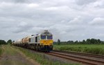 DB Cargo 247 011 (266 411) mit einem Ölzug in Richtung Oldenburg bei Sande am 08.08.16.