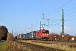 DB Cargo Scandinavia 185 336 mit KLV-Zug in Richtung Osnabrück (bei Diepholz, 04.12.18).