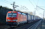 DB Cargo Deutschland AG mit  193 328  [NVR-Number: 91 80 6193 328-2 D-DB] und KLV-Zug (LKW-Walter Trailer) ab Rostock am 27.02.19 Bf.