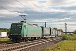 Mit einem  LKW Walter -KLV nach Zeebrugge fuhr am 05.10.2017 die ATLD/XRAIL 145-CL 005 (145 096-4), welche den Zug bis Aachen West führen wird, bei Buggingen in Richtung Freiburg (Breisgau).