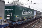 Gelenktaschenwagen vom Einsteller VTG Schweiz GmbH mit der Nr. 37 TEN 80 D-VTGCH 4992 017-6 Sdggmrss in einem Ganzzug am 26.03.24 Höhe Bahnhof Berlin-Hirschgarten.