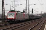 Crossrail 185 594-9 mit 185 599-8 durchfahren Duisburg-Bissingheim 19.3.2016