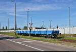 Abgestellter Flachwagen mit der Bezeichnung  Res-x  (37 80 3923 004-0 D-PRESS) vor dem Werkstor der Maschinenbau und Service GmbH in Halle (Saale), Eisenbahnstraße.