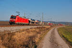 185 167 mit einem Autotransportzug bei Mitteldachstetten Richtung Würzburg, 24.01.2020