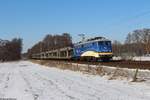 140 798-0 der EVB mit einem leeren BLG-Autotransportzug bei Dauelsen am 13.02.2021