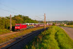 185 250 DB Cargo mit einem offenen Autotransportzug bei Winterhausen Richtung Würzburg, 03.09.2021