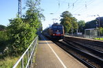 185 599-8 von HSL kommt die Kohlscheider-Rampe hoch aus Richtung Neuss,Herzogenrath mit einem Hyundai-Autozug aus Polen nach Aachen-West und dann weiter nach Belgien und fährt in Richtung