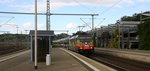 185 602-0 von HSL kommt durch Herzogenrath aus Richtung Neuss mit einem  Polen nach Aachen-West und dann weiter nach Belgien und fährt in Richtung Kohlscheid,Richterich,Laurensberg,Aachen-West.