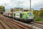 248 034-1 Captrain  Wir begeistern auf der Schiene. Gr�n. Innovativ Voraus.  mit Stahlzug in Wuppertal, September 2026.