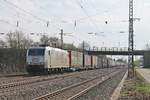 Am 02.04.2019 bespannte 185 537-8 den  WETRON/Jan de Rijk -Containerzug (Melzo Scalo - Wanne Eikel), als sie durch den Bahnhof von Müllheim (Baden) im Rheintal in Richtung Freiburg (Breisgau).