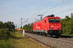 Am Nachmittag des 24.05.2019 fuhr Maqaurie/RHC 2051 (185 582-4) mit dem  Bauer -Containerzug nach Basel, als sie südlich vom Haltepunkt Buggingen über die RHeintalbahn durchs